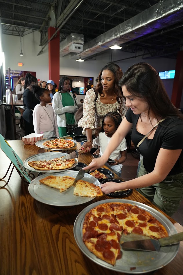 Moms and kids at the pizza buffet