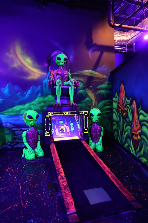 Glow-in-the-dark alien mini golf hole